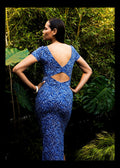Lifestyle image of model showing the back details of the Be Right Back dress